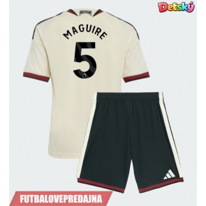 Lacne Dětský Futbalové dres Manchester United Harry Maguire #5 2026-27 Krátky Rukáv - Tretina (+ trenírky)